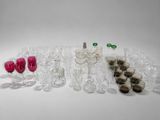 a lot of wine glasses that are sitting on a table
