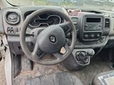 a dashboard of a car with a steering wheel and dashboard controls