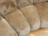 a picture of a couch that has been cleaned and is sitting on the floor