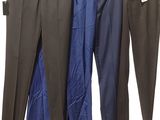 three men ' s pants hanging on a clothes line against a white background