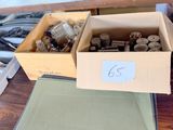 a box of rocks on a table next to a box of rocks