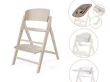 une photo d'une chaise haute pour bébé et une chaise haute pour bébé