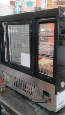 an image of a microwave oven sitting on top of a counter