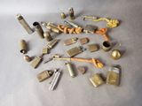 many different types of brass objects on the table