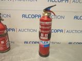two fire extinguisors sitting next to each other
