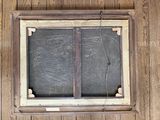a picture of a window on a wooden wall