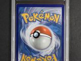 a close up of a pokemon card on a table