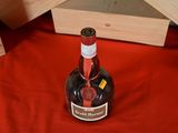 a bottle of wine that is sitting on a table