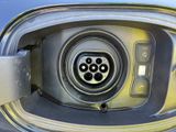 an image of a close up of an electric car ' s charging point