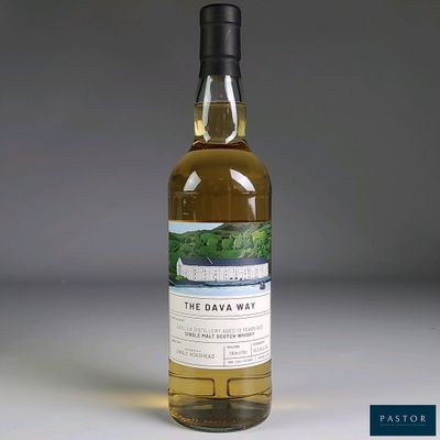 an image of a bottle of whisky sitting on top of a table