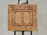 a picture of an easel with a painting on it