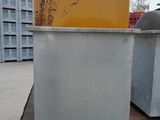 a yellow box sitting on top of a pallet