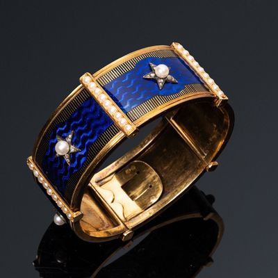 Bracelet jonc rigide ouvrant en or 18k (750e), composé de pa… - Photo 1