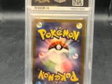 a close up of a pokemon card in a clear box