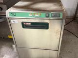 an image of a commercial dishwasher in a kitchen