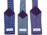 three pairs of ties with different patterns on them on a white background