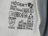 a close up of a pair of gloves with a label on it
