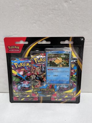 a close up of a box of pokemon cards on a white surface