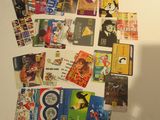 a refrigerator with many different magnets on it
