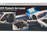 a box with a model of a car in it