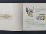 an open book with a picture of a cartoon character on it