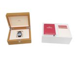 a box with a watch inside of it and a watch inside of it