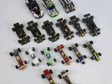 a lot of toy cars that are sitting on a table