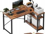 a computer desk with a printer on top of it