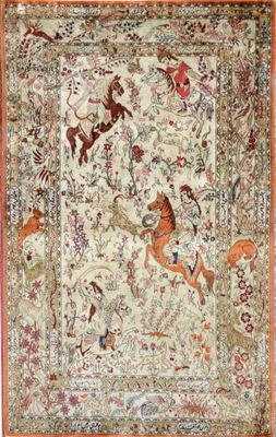 an antique persian rug with horses and birds on it