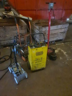 Cric pneumatique, Clef à choc pneumatique, Chargeur batterie… - Photo 1