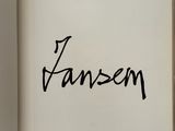 a close up of a book with a handwritten title on it