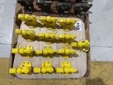 a box with a bunch of yellow valves on it