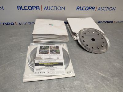 a pile of paper sitting on top of a table next to a machine