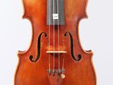 a close up of a violin with a bow on a white background