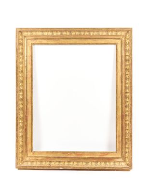 an antique gold frame with a white background