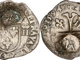 a silver coin with a shield and shield on it