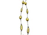 a long necklace with gold glass beads and a silver chain