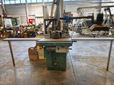 a machine that is sitting on a table in a building