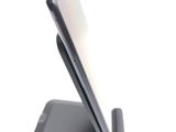 a cell phone that is sitting on top of a stand
