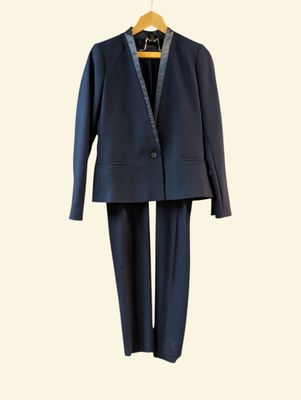 an image of a suit hanging on a hanger