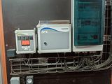 a machine that is connected to a wall with wires