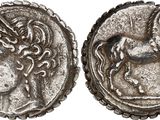 a silver coin with an image of a woman and a horse on it
