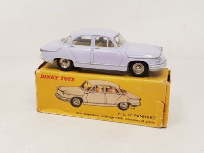 a toy car that is sitting on top of a box