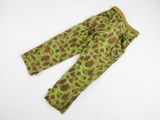 a close up of a pair of camouflage pants on a white surface