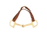 the horse bitt is made of leather and has a brass buckle