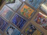 many different types of pokemon cards on the table