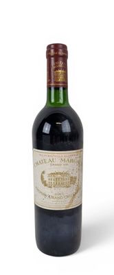 a bottle of wine that is sitting on a table