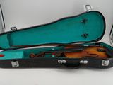 a violin case with a violin inside of it