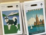 two boxes with a picture of a dog on them on a table