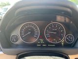 a close up of a car dashboard with various gauges and numbers